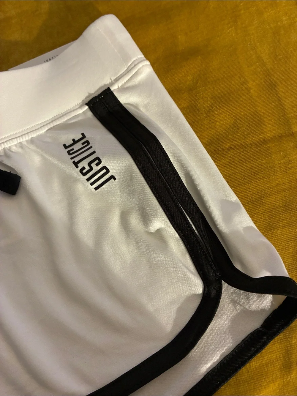 Justice White Athletic Shorts with Black Trim and Drawstring
